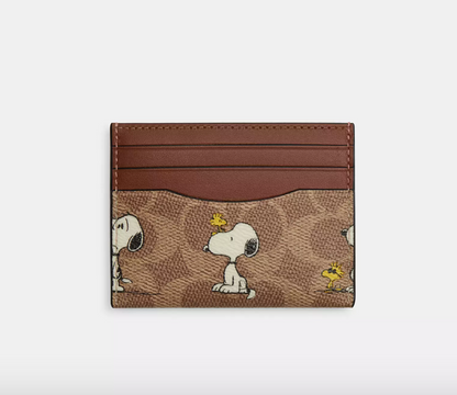 Coach X Peanuts - Slim Id Card Case In Signature Canvas With Snoopy Print