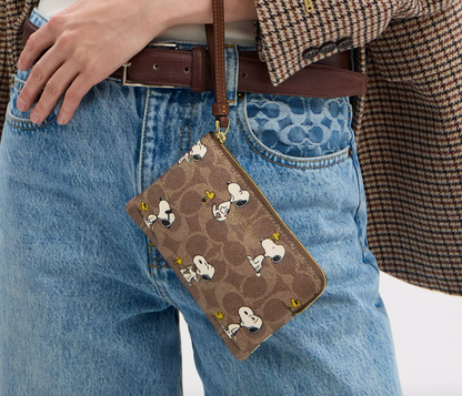 Coach X Peanuts - Corner Zip Wristlet In Signature Canvas With Snoopy Print